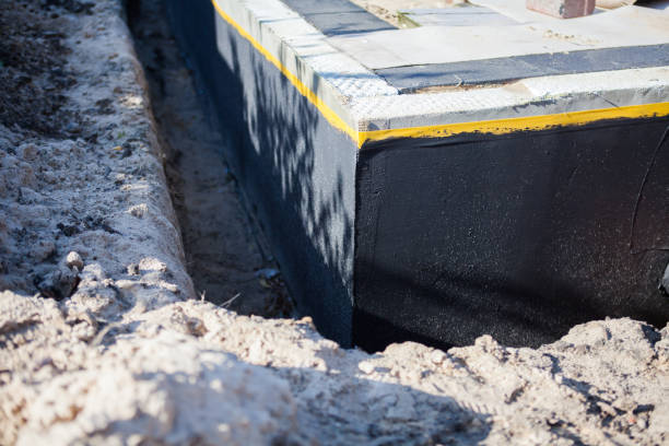 Professional Waterproofing technician working in Elwood, IN